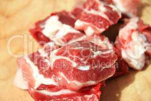 Fresh pork cutting on the wooden desk