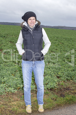 woman walks in stormy weather