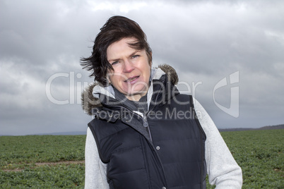 woman walks in stormy weather