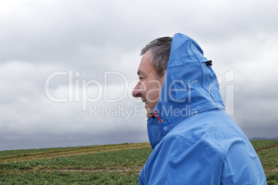 man running in rainy stormy weather