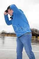 man running in rainy stormy weather