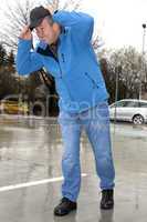 man running in rainy stormy weather