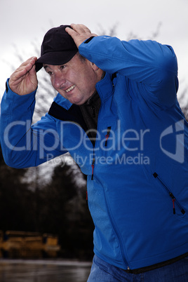 man running in rainy stormy weather