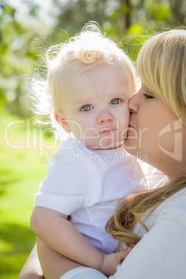 Young Mother Holding Her Adorable Baby Boy