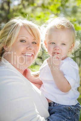 Young Mother Holding Her Adorable Baby Boy