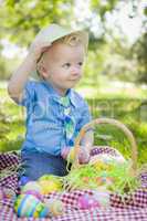 Cute Little Boy Outside Holding Easter Eggs Tips His Hat