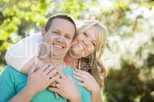 Young Attractive Couple Hugging in the Park