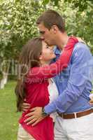 Beautiful embraced couple in the park