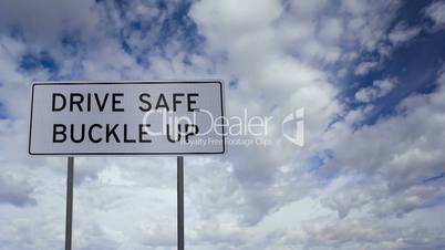 Sign Drive Safe Buckle Up Clouds Timelapse