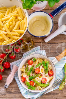 noodles with asparagus in cream-cheese sauce