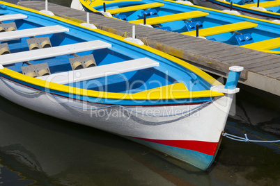 rowboats on the jetty