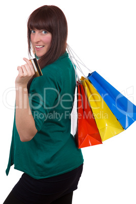 lachende frau beim einkaufen mit kreditkarte