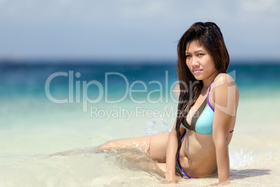beautiful young filipina woman at the seaside