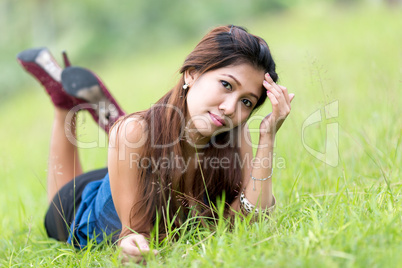 beautiful young filipina woman enjoying nature