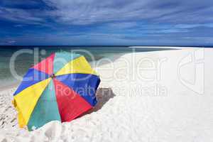 sunshade on tropical white beach