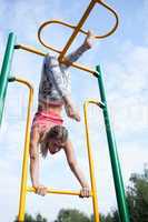 beautiful young gymnast working out outdoors