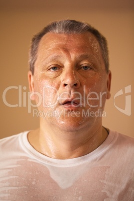 tired looking middle-aged man after a workout