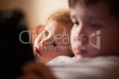 cute young child relaxing with his brother