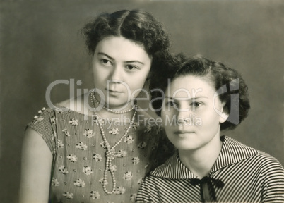 vintage portrait of two attractive women