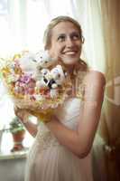 beautiful young bride with a wedding bouquet