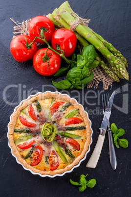 green asparagi tart with eggs and tomato