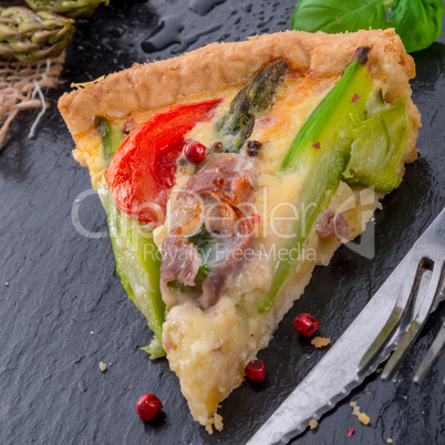 green asparagi tart with eggs and tomato