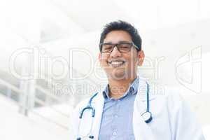 smiling asian indian male medical doctor