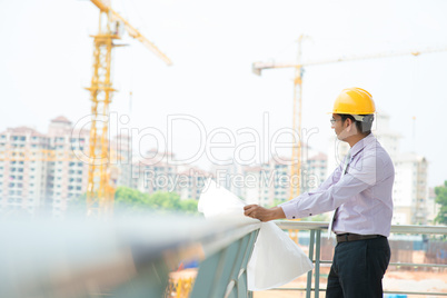 asian indian architect at construction site