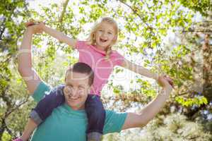 Cute Young Girl Rides Piggyback On Her Dads Shoulders