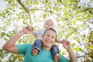 Cute Young Boy Rides Piggyback On His Dads Shoulders