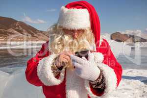 Santa Claus standing outdoors at ice