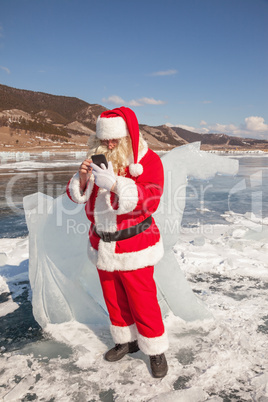 Santa Claus standing outdoors at ice