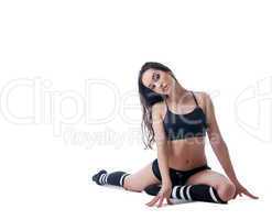 Charming slim woman doing fitness exercise