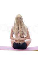 Back view of long-haired blonde doing yoga