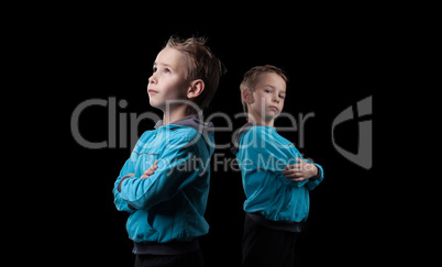 Nice little twins isolated on black background