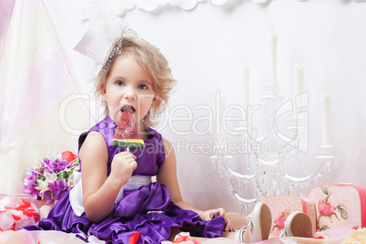 Cute elegant girly posing with watermelon candy
