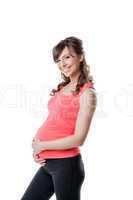 Portrait of happy active pregnant woman
