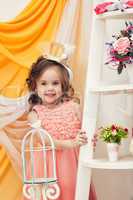 Image of cute little model posing in smart dress