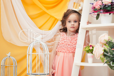 Portrait of lovely girl posing in vintage interior