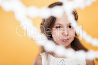 Portrait of beautiful young brown-eyed girl