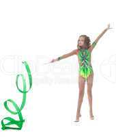 Charming young artistic gymnast dancing in studio