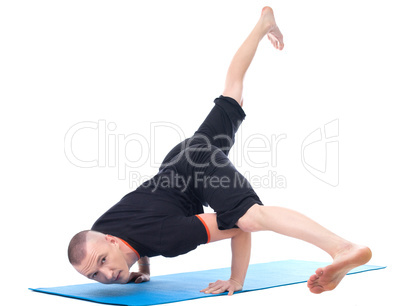 Image of yogi posing in studio looking at camera