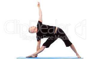 Energetic middle-aged man doing yoga poses