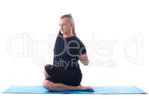 Image of yoga instructor posing in studio