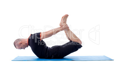 Image of flexible yogi posing in difficult asana