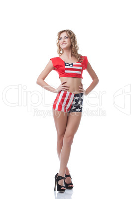 Happy young girl posing in patriotic costume
