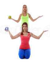 Pretty athletic girls posing with gymnastic balls