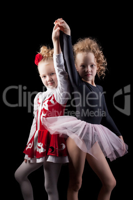 Cute young girls in dresses for performances