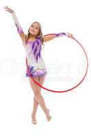 Young artistic athlete performs with hula hoop
