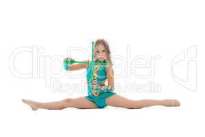 Beautiful artistic gymnast sitting on split